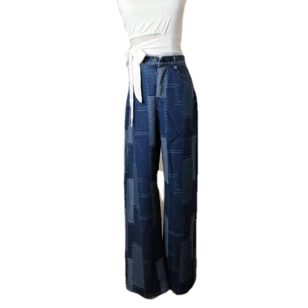 Amazing pair of dark blue washed denim jeans.